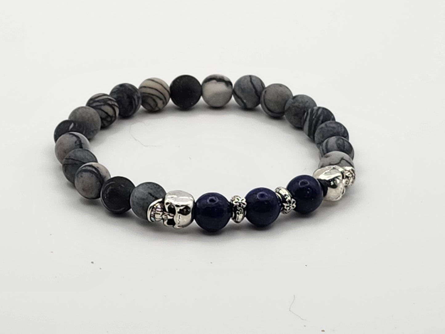 Natural black Picasso jasper (matte) w/skull accents