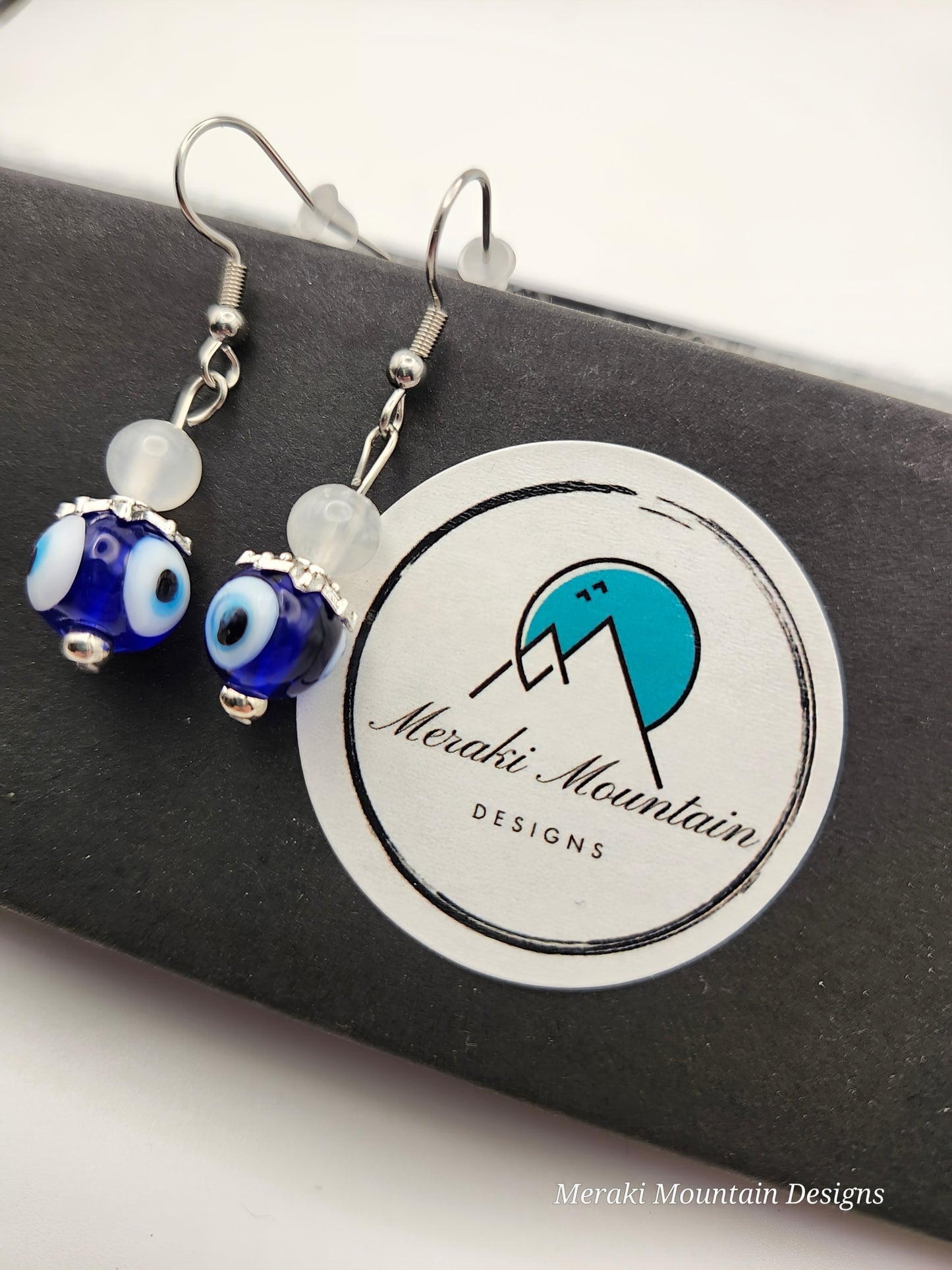 Evil eye + Selenite Earrings